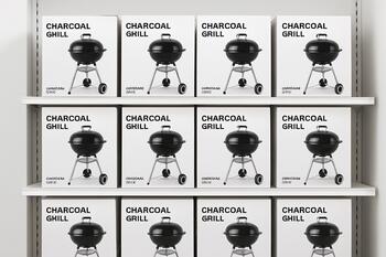 Retail shelf with boxed grills neatly stacked